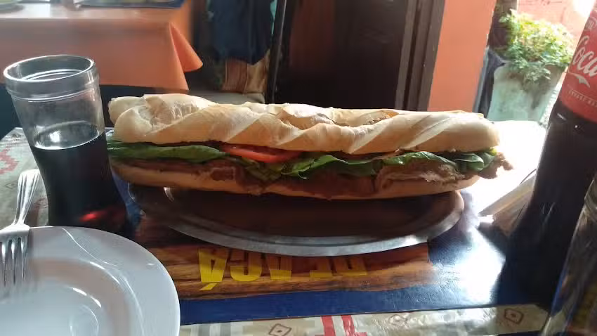 Parrilla De Aqui A La Esquina